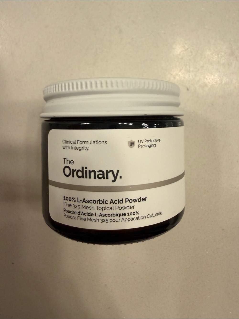 The Ordinary White and Black Skincare Powder Jar